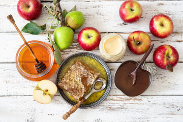 Honey, apple, honey comb , table set with traditional food for Jewish New Year Holiday, Rosh Hashana
