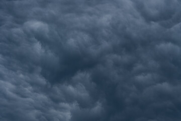 Storm rain clouds background. Dramatic dark sky.