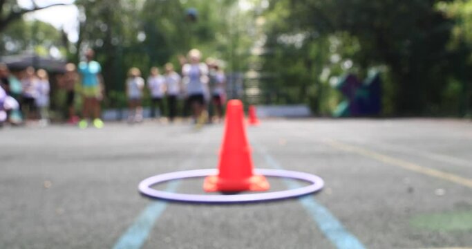 boys and girls of school age run chasing on the sports ground. The concept of healthy parenting. Children's sports competitions. blurred focus