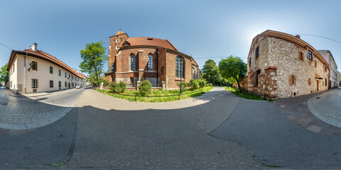 Fototapeta na wymiar full 360 hdri panorama on near catholic gothic church red brick walls in old town with historical buildings, temples and town hall in equirectangular projection