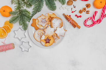 Fototapeta na wymiar Christmas flat lay with traditional Christmas linzer cookies, top view