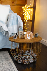 decorative coffee table-basket with Christmas romantic decor in a cozy room