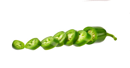 fresh green cut chili pepper pieces isolated on white background.
