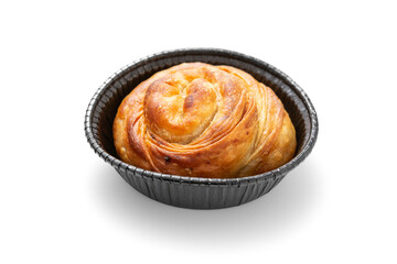 Meat pie in foil tray on white background