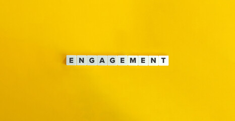 Engagement Word and Banner. Block Letter Tiles on Yellow Background. Minimal Aesthetics.