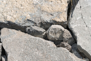 landscaping boulders by the edge of the lake
