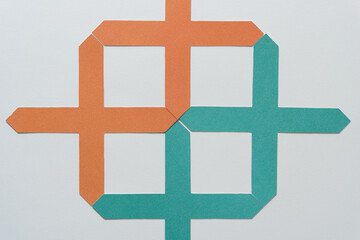 Fototapeta premium paper shape composed of several paper crosses