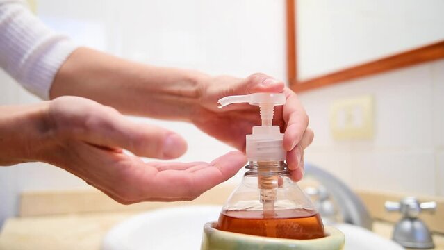 adult woman, putting liquid soap to wash hands, hygiene, prevent diseases, cholera, preventing diseases