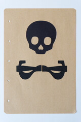 paper skull and interrobangs as crossbones