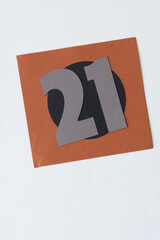 twenty-one on paper frame with circle 
