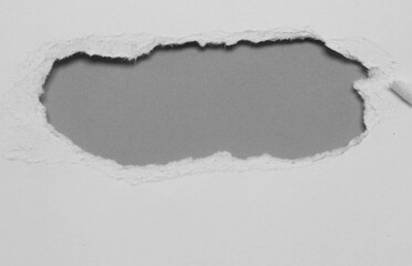 pieces of torn hole paper texture background with copy space for text