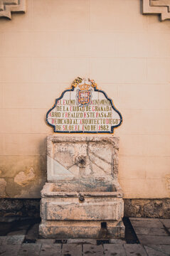 Fountain of a spout tribute to the architect Diego de Siloe in the city of Granada, Spain