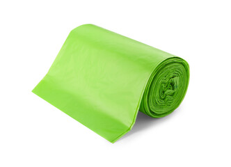 Roll of green garbage bags isolated on white