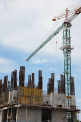 Fototapeta na wymiar View of construction site with modern tower crane