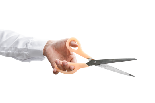 Hand holding scissors isolated on transparent background - PNG format.