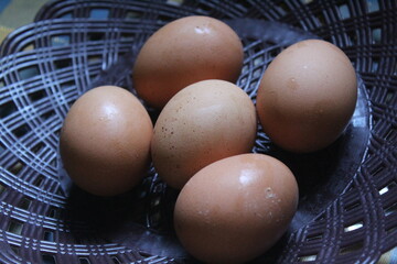 some raw eggs on a plate