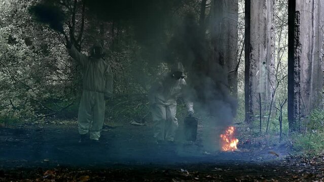 Polluted, post nuclear area with abandoned warehouse and colorful smoke. Scientist in safety uniforms picking samples carrying signal flares
