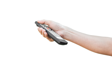 Hand holding television remote control on transparent background - PNG format.