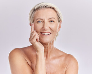 Senior woman applying beauty sunscreen, face cream or moisturizing lotion on skin isolated on...