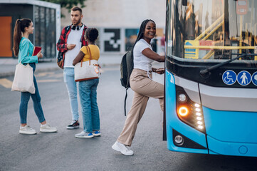 African american woman entering the bus