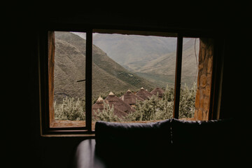 looking through the window of a mountain lodge in lesotho
