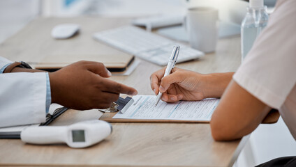 Patient hands writing, filling in medical insurance form for information in professional clinic or hospital room. Doctor, medicine consultant or healthcare worker advising woman during consultation.