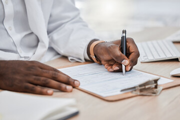 Doctor writing a prescription or medical history, record or insurance in his office and working on a health document. Closeup of a healthcare black male professional or GP signing a contract - obrazy, fototapety, plakaty