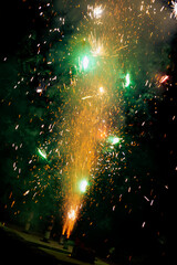 Fireworks going off at night 