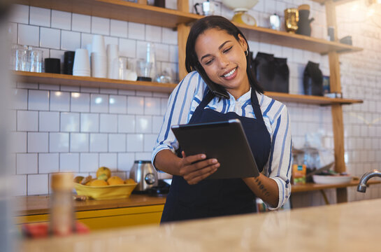 Restaurant worker on tablet, phone call and making food payment, delivery or crm conversation with a customer. Business owner or manager of fast food store, coffee shop or cafe shopping for supplies