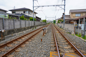 Obraz premium Local train roadway and grade crossing in Uji, Kyoto, Japan