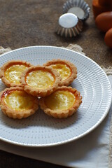 milk tarts on the wooden background 