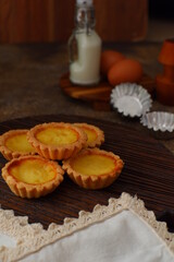 milk tarts on the wooden background 