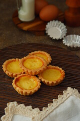 milk tarts on the wooden background 