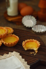milk tarts on the wooden background 