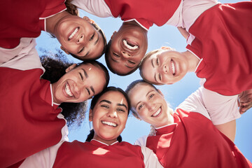 Female soccer team in a huddle smiling in unity and support in a circle. Below portrait of an...