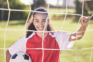 Happy, motivation and woman soccer player with a football ready for a workout, match or exercise. Portrait of a teen student girl in a sport uniform before fitness and school sports training field - Powered by Adobe