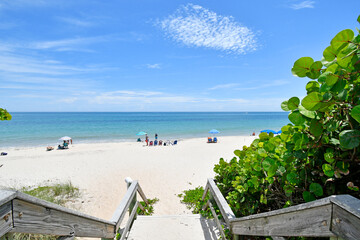 Boardwalk leading to a view of calm, sandy, and uncrowded Vero Beach, Florida on Hutchinson Island