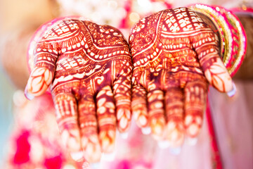 Beautiful henna design on the hand of a Hindu bride on her wedding eve.