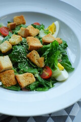 a plate of salad in white background