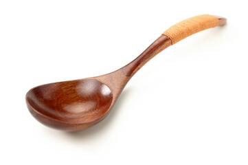 Wooden spoon isolated on white background