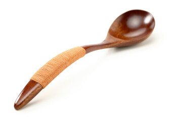 Wooden spoon isolated on white background