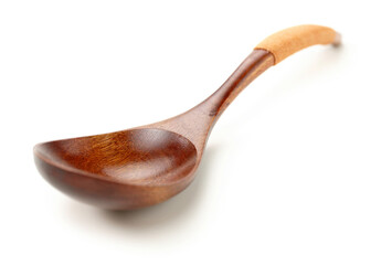 Wooden spoon isolated on white background