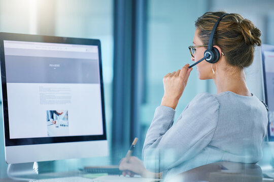 CRM call center agent talking using wireless headset, consulting client online, giving feedback, working on computer. Helpdesk hotline support operator browsing internet doing customer service work.