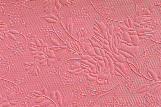 Tooled floral pattern in pink leather.