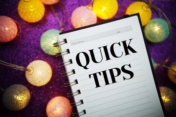 Quick Tips text message on notepad background