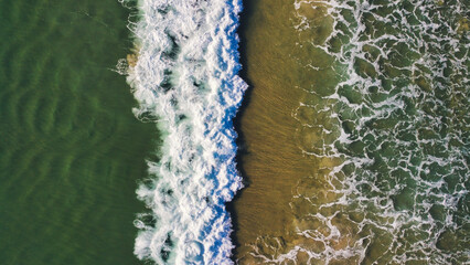 Drone view from the waves in florianopolis
