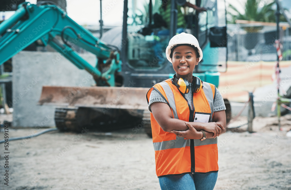 Canvas Prints happy woman construction worker with a ready to work smile on a job site outside. portrait of a prou