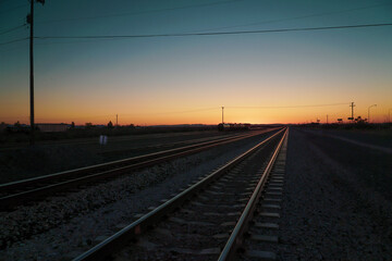 Obraz na płótnie Canvas Train Tracks at Sunrise