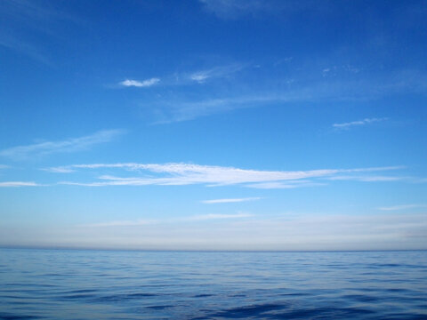 Sunny blue sky with sea horizon texture.