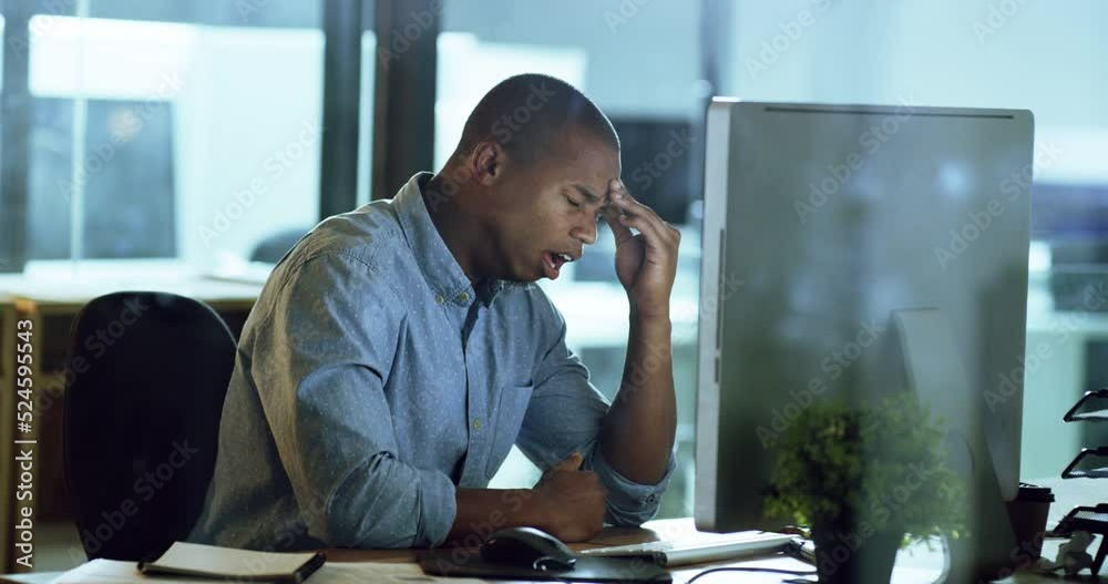 Poster yawning, tired and late night work of business man working on a office computer online. stress heada